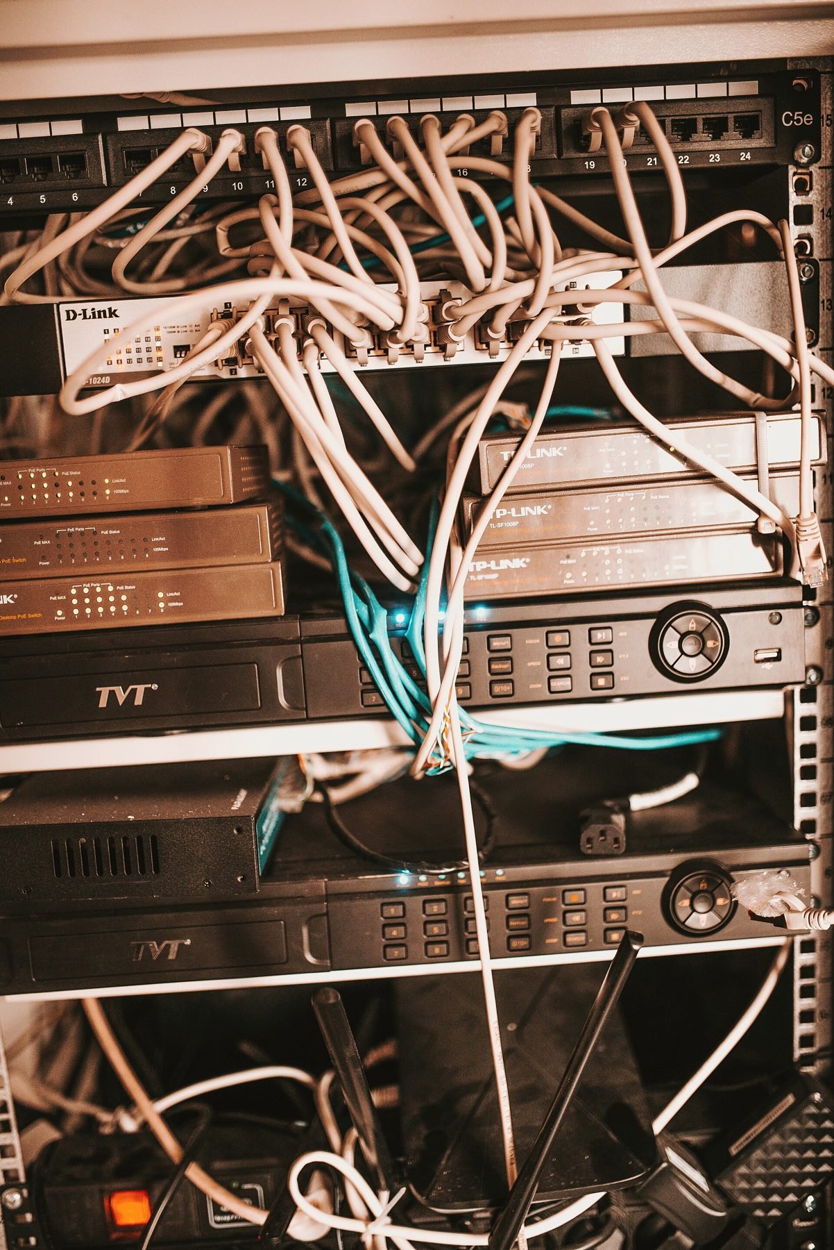 A wiring frame and stacked radio equipment in a rack.